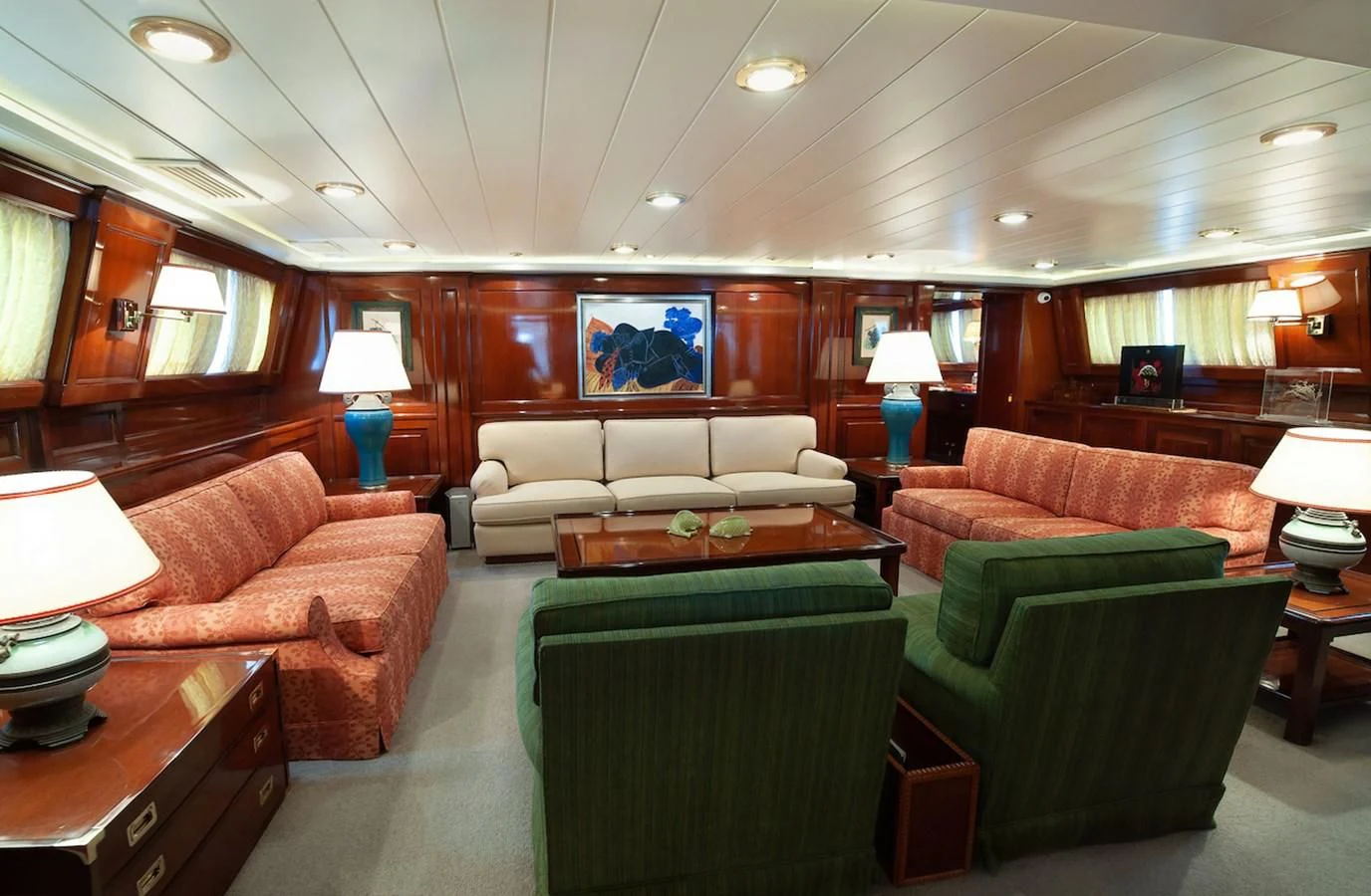 a living room with a couch and a table aboard BELLE BRISE Yacht for Sale