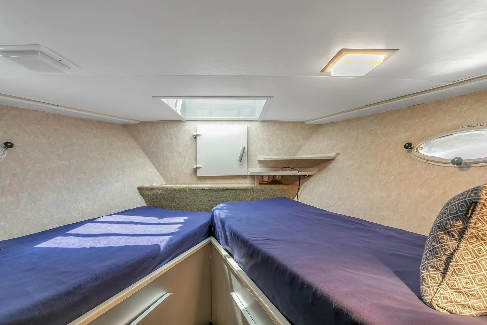 a room with bunk beds aboard LA VIDA Yacht for Sale