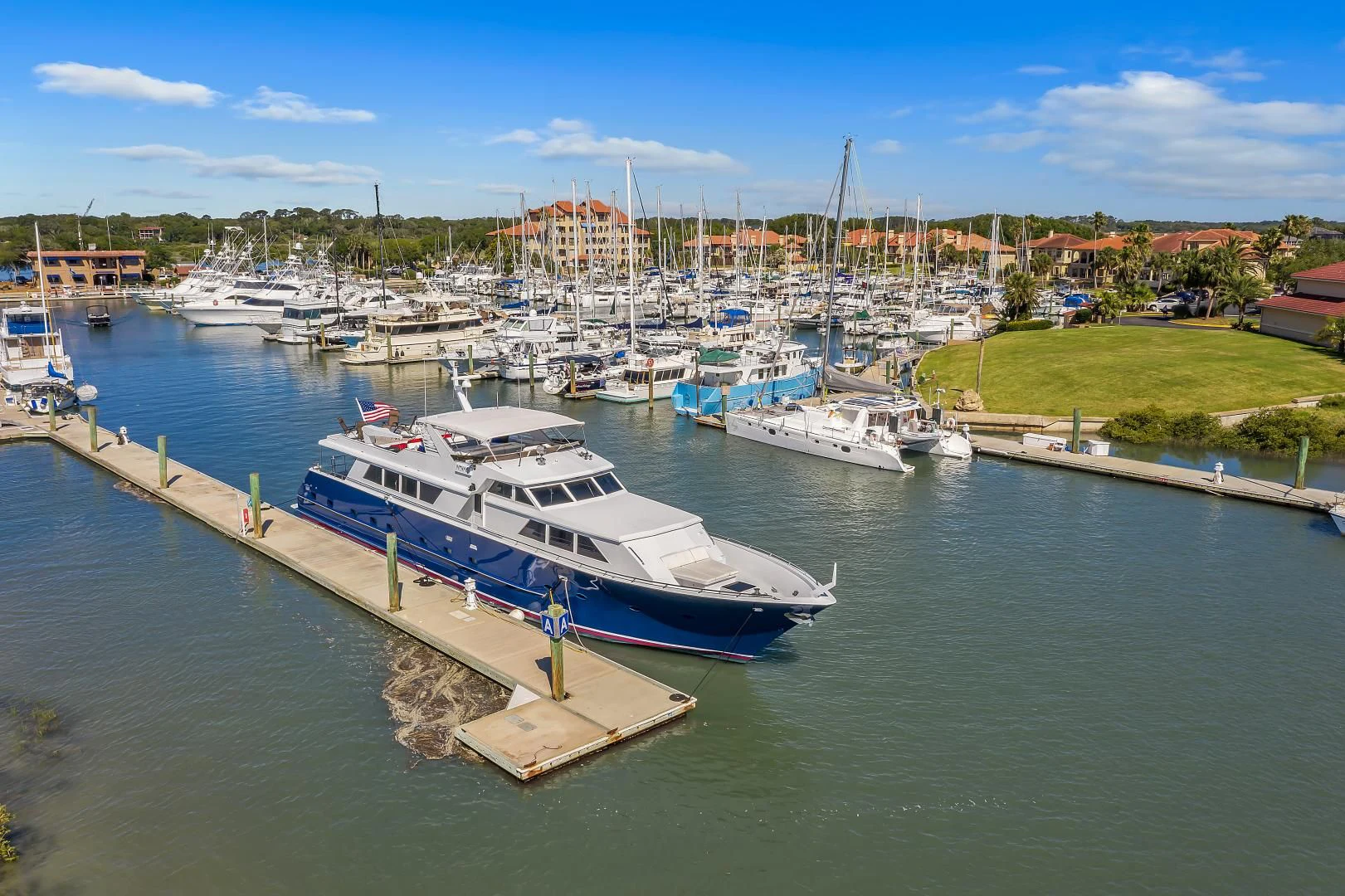boats docked at a pier aboard LA VIDA Yacht for Sale