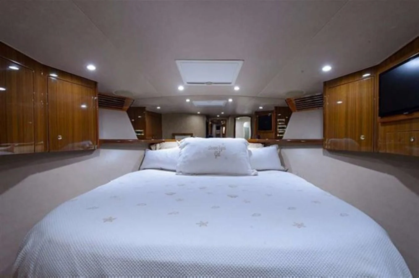 a large bed in a room aboard DON'T STOP BELIEVIN Yacht for Sale