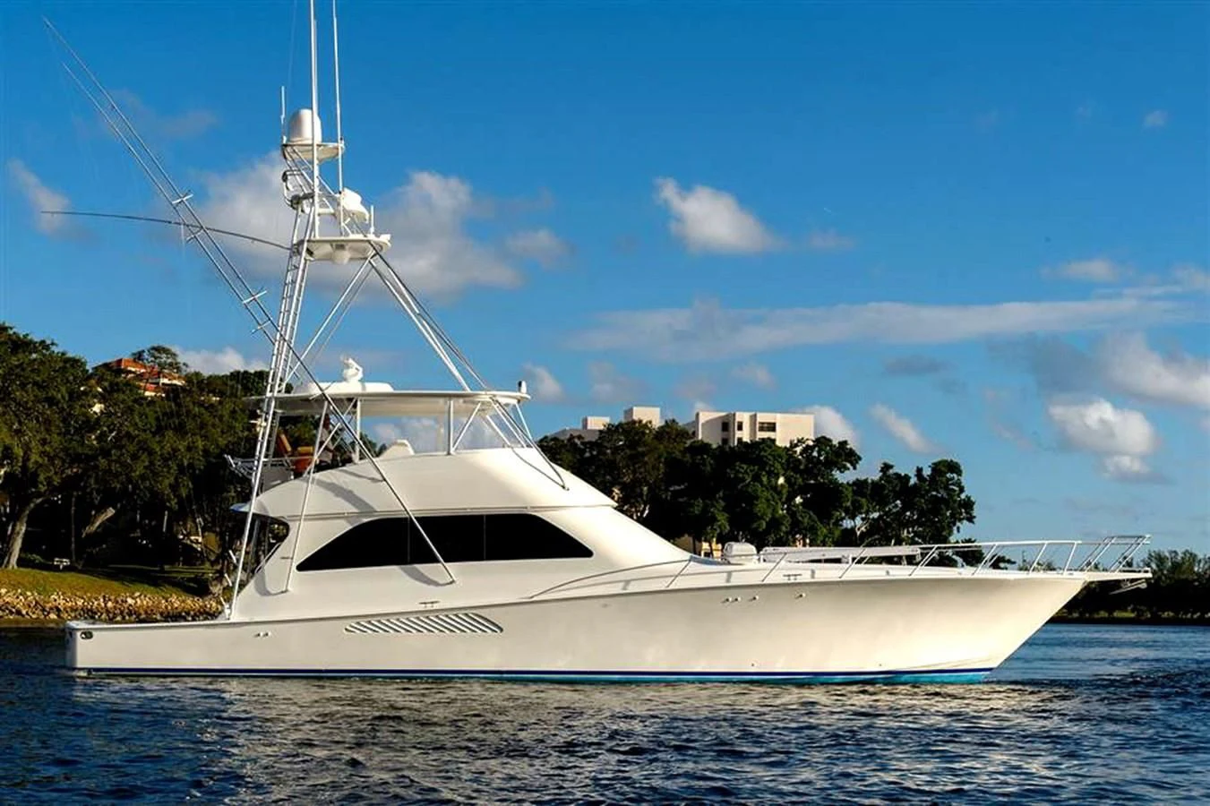 a white boat on the water aboard DON'T STOP BELIEVIN Yacht for Sale