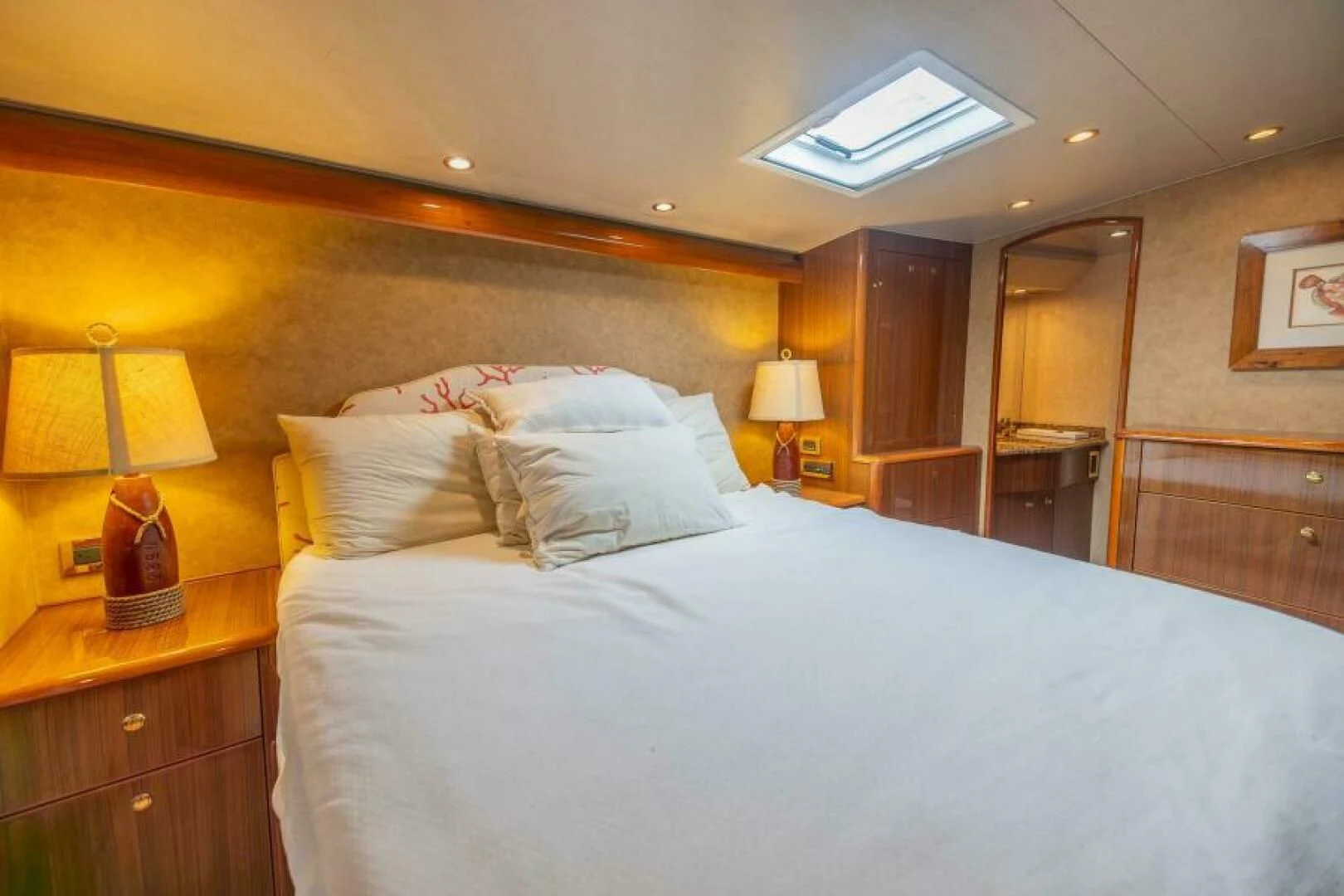 a bed with white sheets aboard DON'T STOP BELIEVIN Yacht for Sale