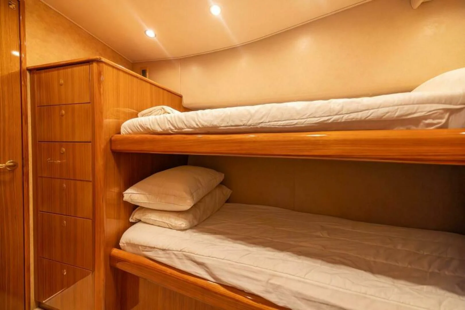 a bed with white sheets aboard DON'T STOP BELIEVIN Yacht for Sale
