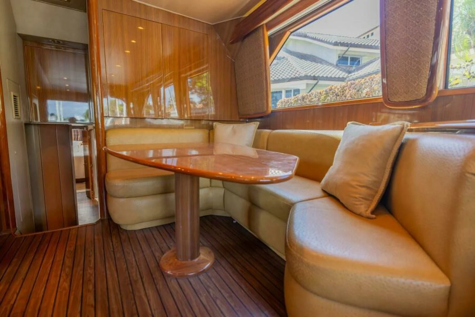a living room with a table and chairs aboard DON'T STOP BELIEVIN Yacht for Sale