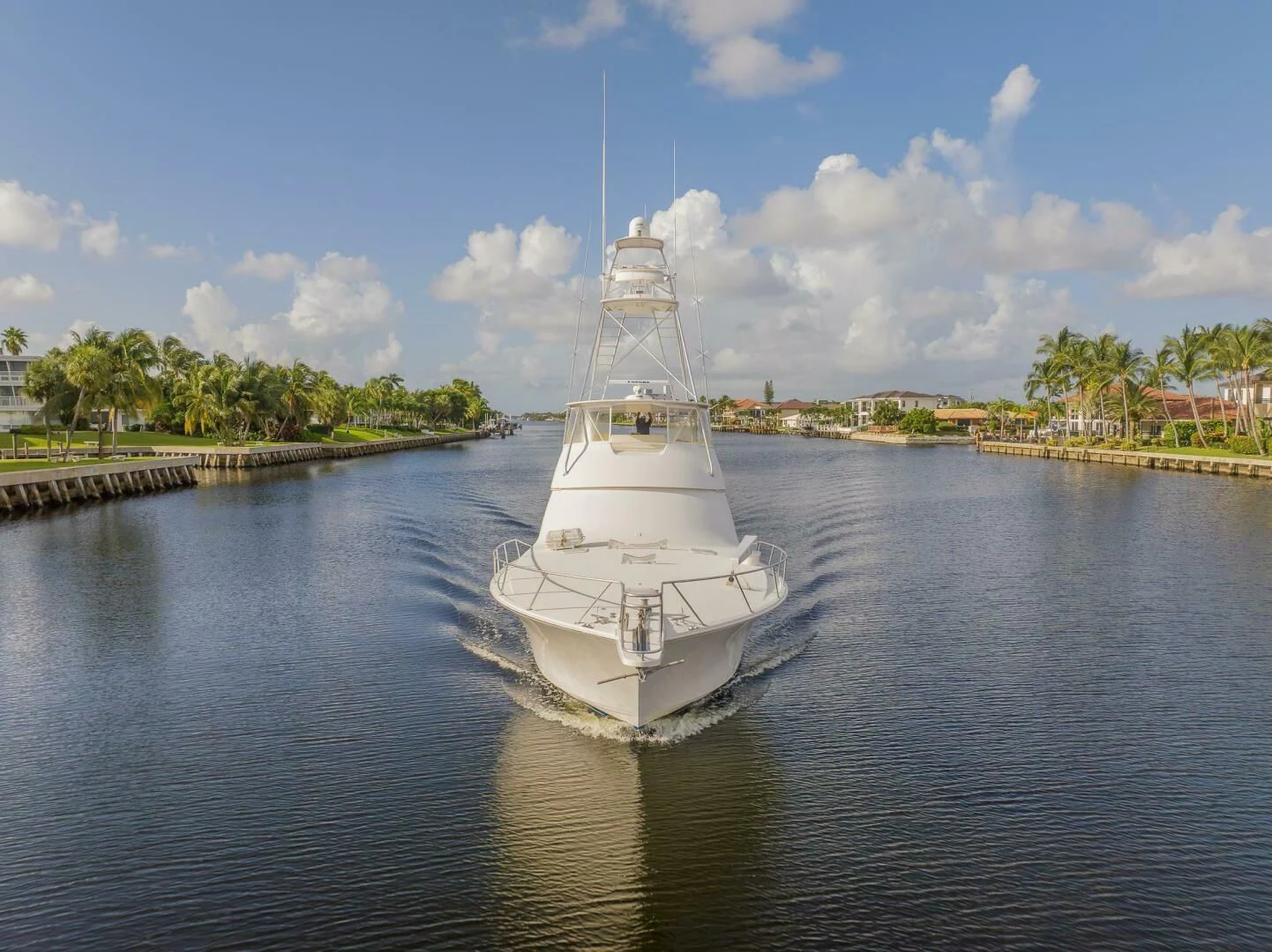 a white boat on water aboard DON'T STOP BELIEVIN Yacht for Sale