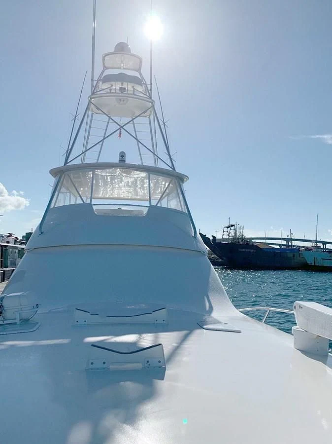 a large white boat in the water aboard DON'T STOP BELIEVIN Yacht for Sale
