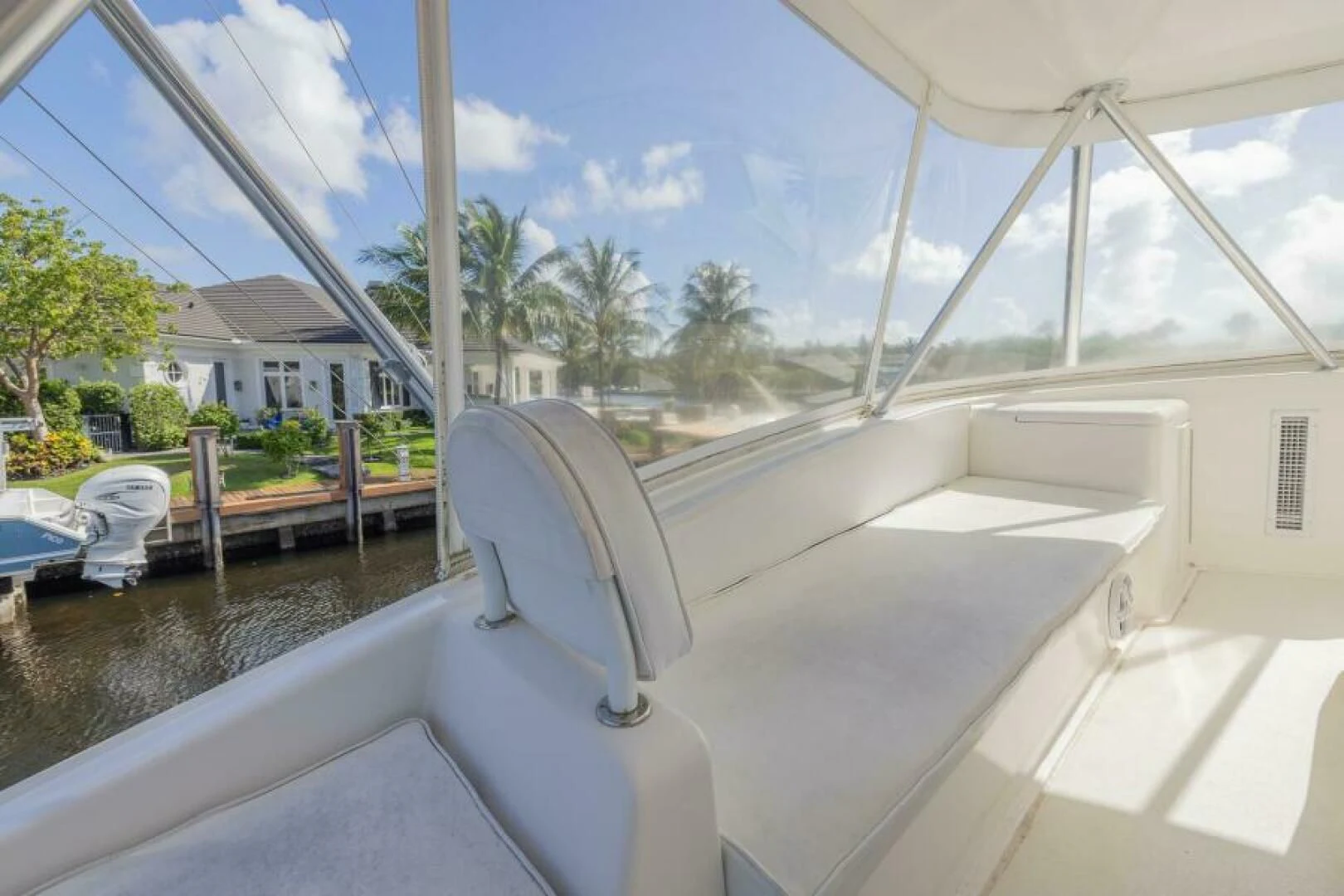 a white chair on a deck aboard DON'T STOP BELIEVIN Yacht for Sale