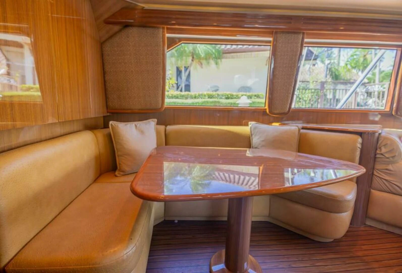 a table with pillows on it aboard DON'T STOP BELIEVIN Yacht for Sale