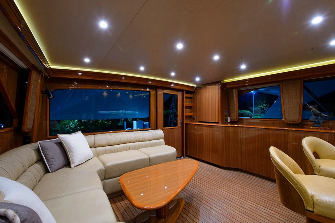 a living room with a large window aboard DON'T STOP BELIEVIN Yacht for Sale