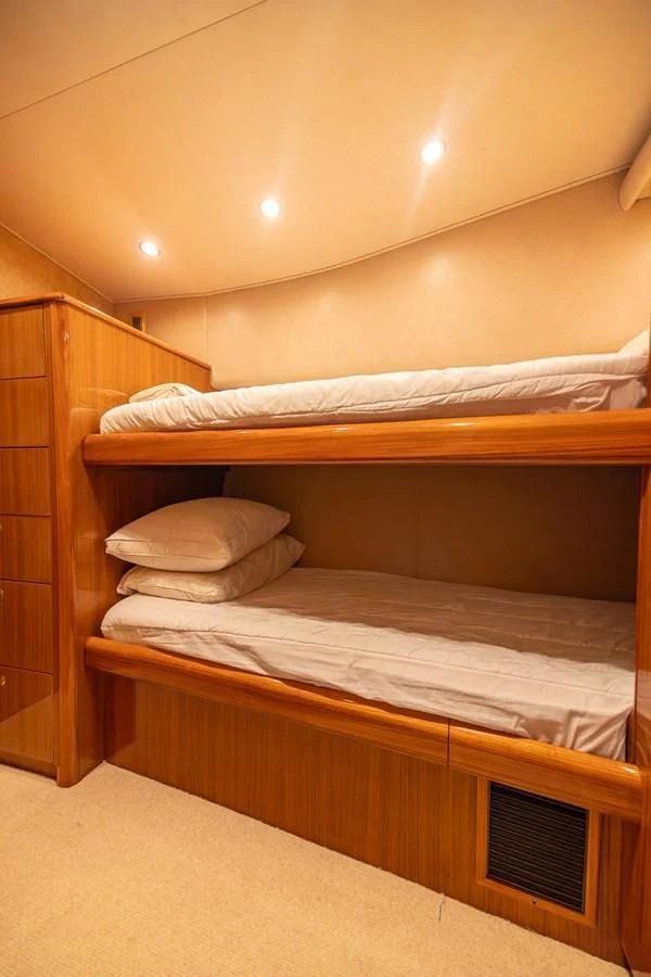 a couple of beds in a room aboard DON'T STOP BELIEVIN Yacht for Sale