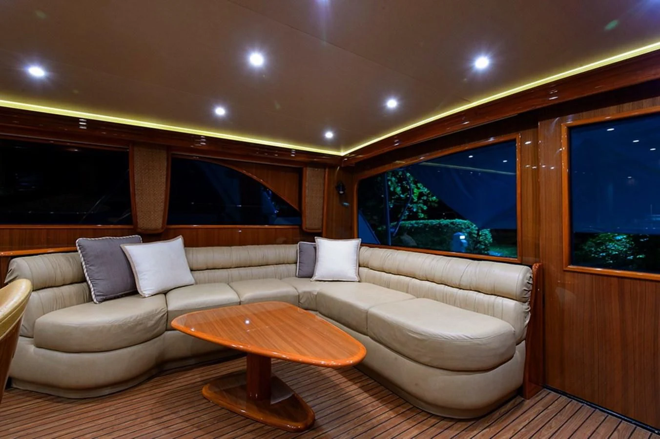a living room with a couch and a table aboard DON'T STOP BELIEVIN Yacht for Sale