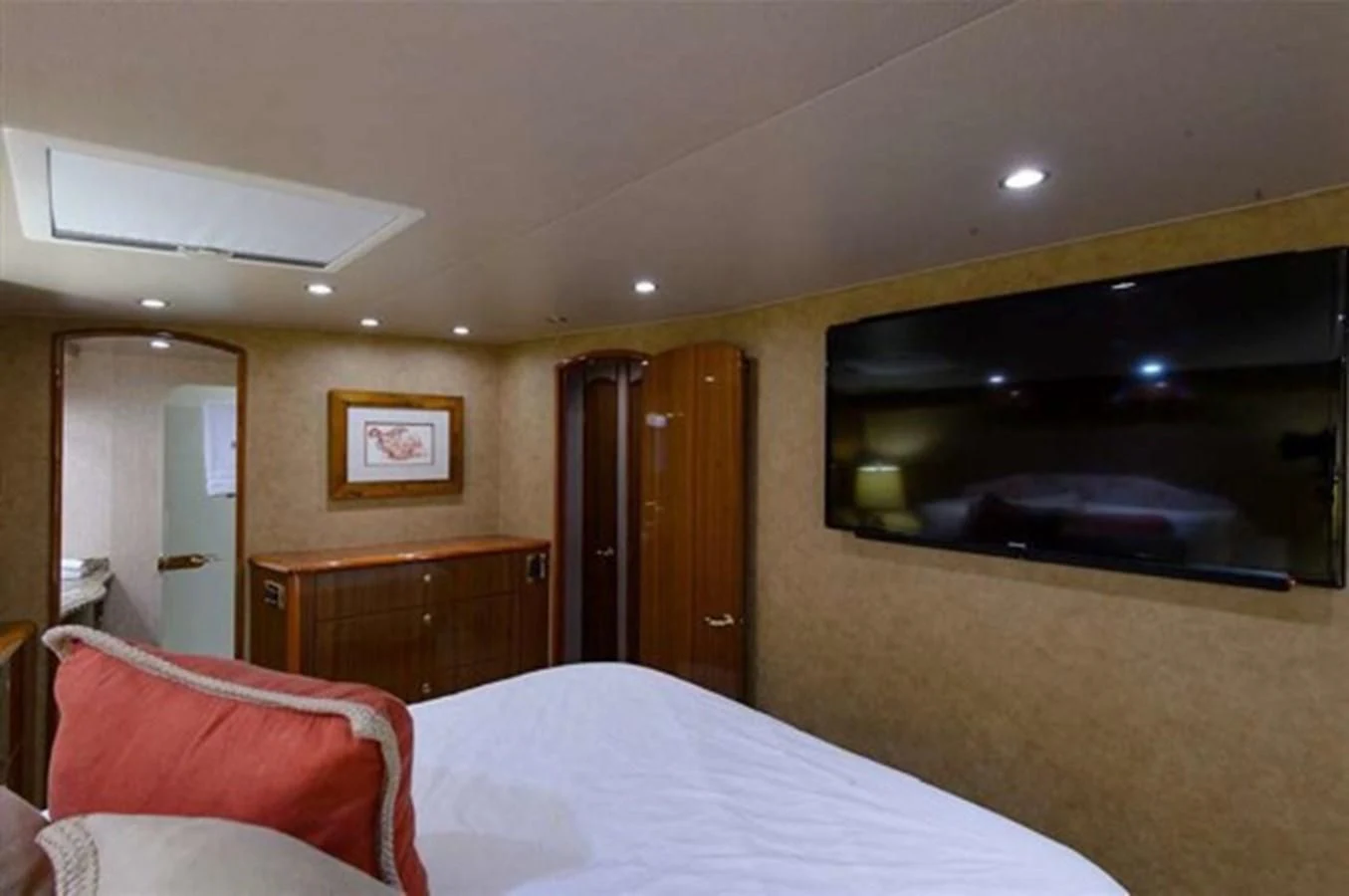 a hotel room with a tv on the wall aboard DON'T STOP BELIEVIN Yacht for Sale