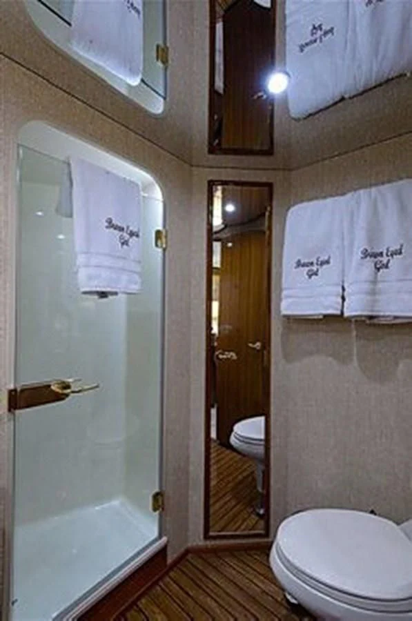 a bathroom with a toilet and a sink aboard DON'T STOP BELIEVIN Yacht for Sale