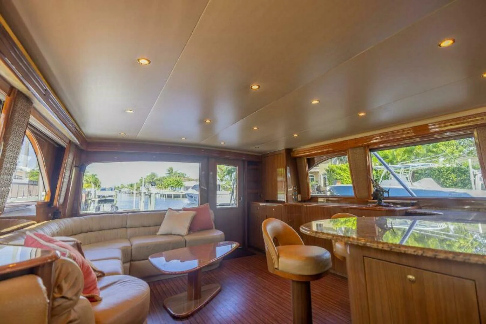 a living room with a large window aboard DON'T STOP BELIEVIN Yacht for Sale