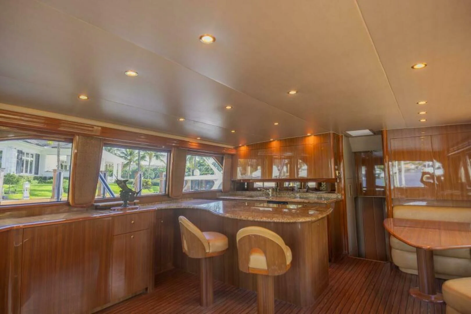 a kitchen with wooden cabinets aboard DON'T STOP BELIEVIN Yacht for Sale
