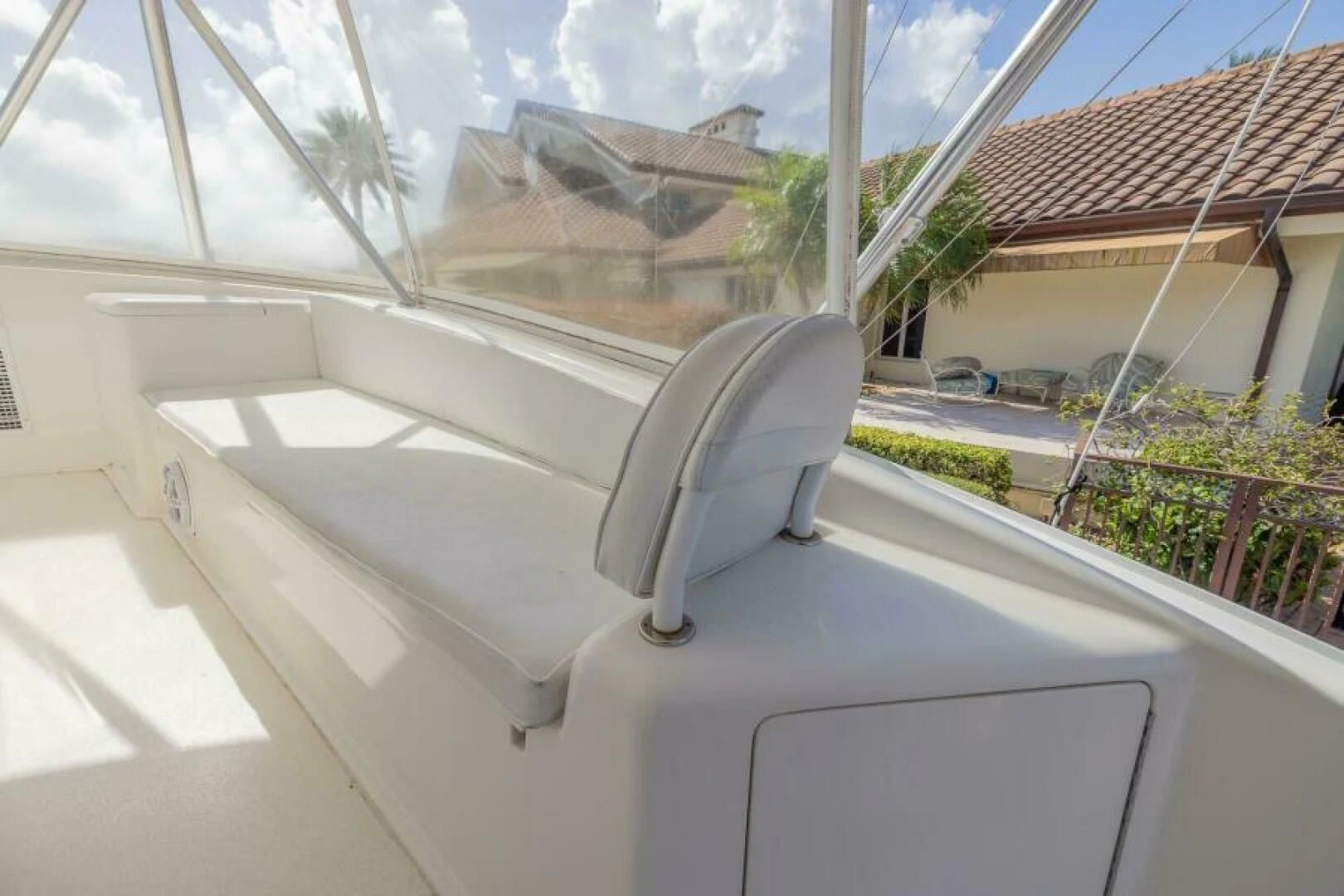 a chair on a balcony aboard DON'T STOP BELIEVIN Yacht for Sale