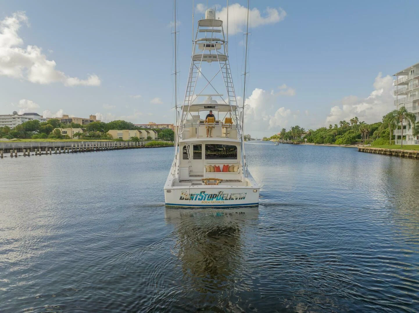 a white boat on water aboard DON'T STOP BELIEVIN Yacht for Sale