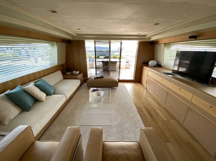 a living room with a large window aboard SULA Yacht for Sale