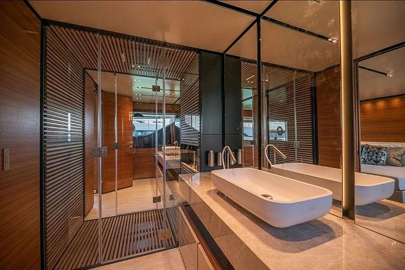 a large bathroom with a large tub aboard SK Yacht for Sale