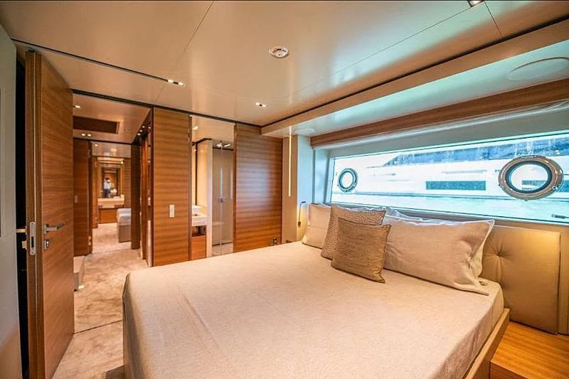 a bed in a room aboard SK Yacht for Sale