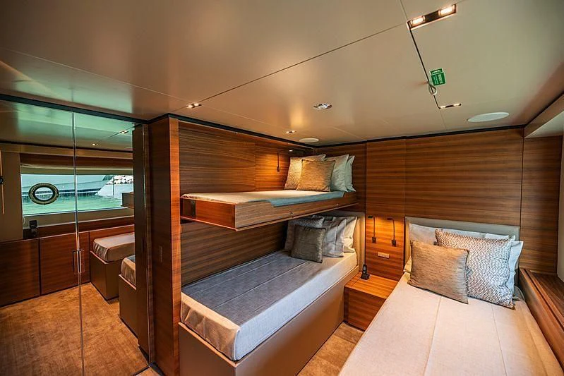 a bed in a room aboard SK Yacht for Sale
