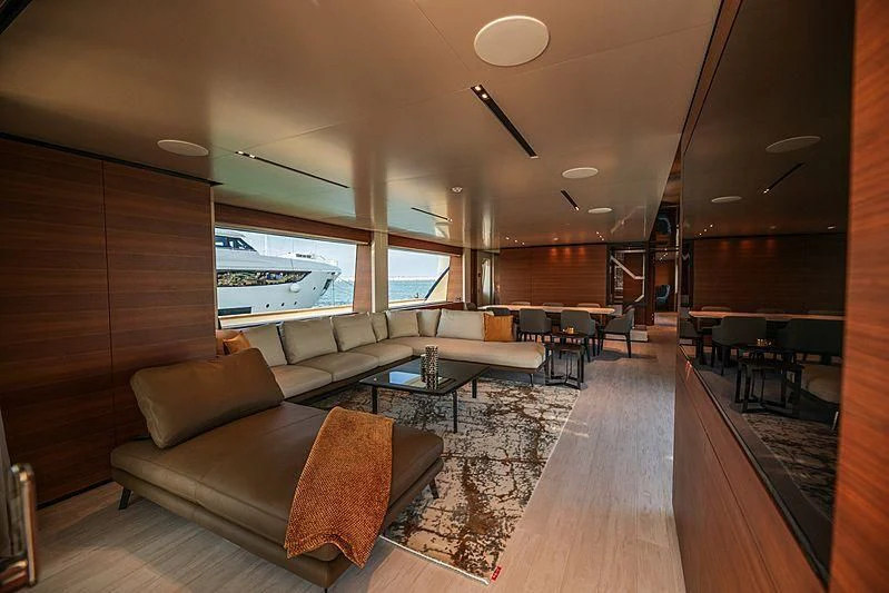 a living room with a large window aboard SK Yacht for Sale