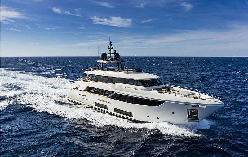 a white yacht on the water aboard SK Yacht for Sale