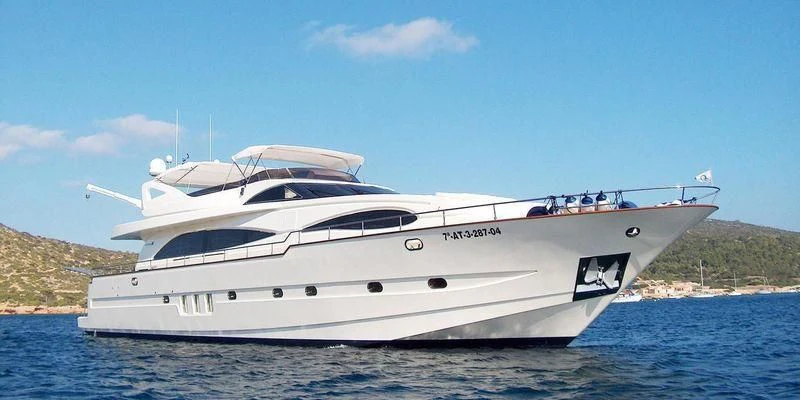 a white yacht on the water aboard ILLA PUERTO PORTALS Yacht for Sale