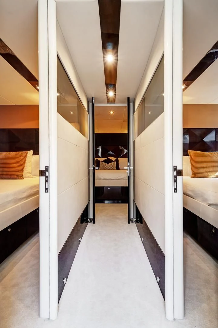 a hallway with a glass door aboard LADY H Yacht for Sale