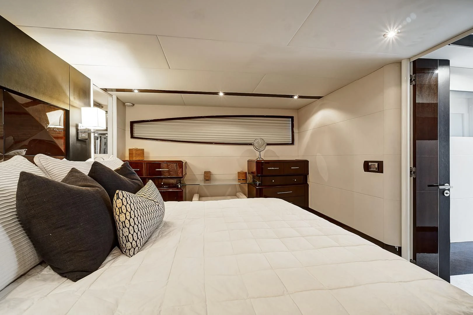 a bed with pillows aboard LADY H Yacht for Sale