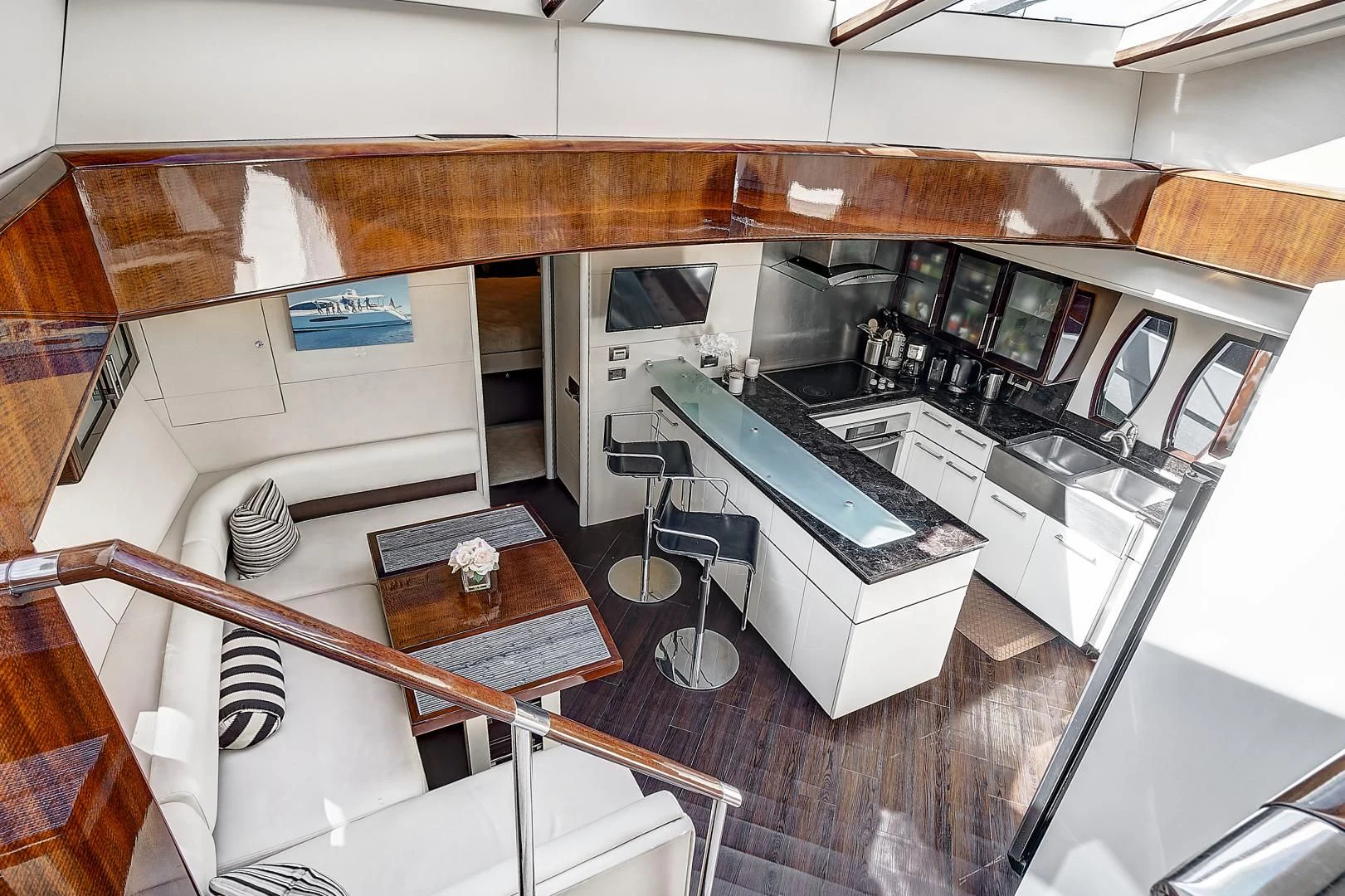 a kitchen with a large island aboard LADY H Yacht for Sale