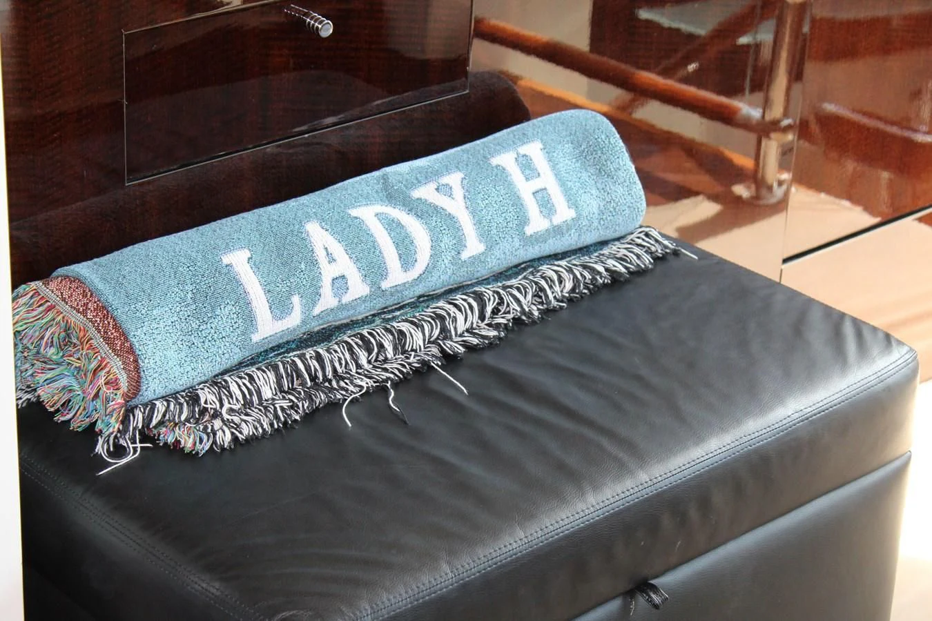 a pair of grey shoes aboard LADY H Yacht for Sale