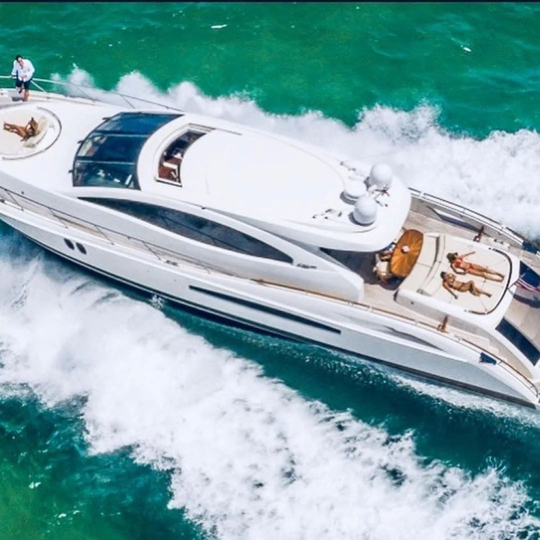 a white boat on water aboard LADY H Yacht for Sale