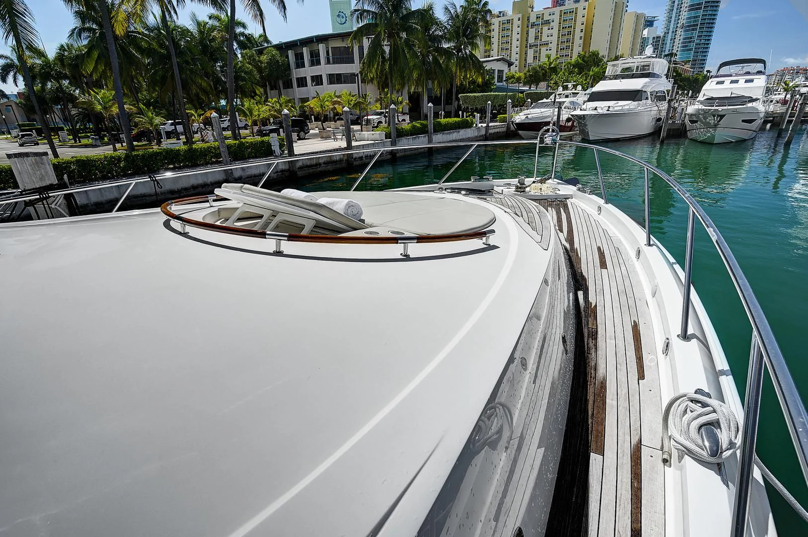 a boat is parked on the side of a river aboard LADY H Yacht for Sale