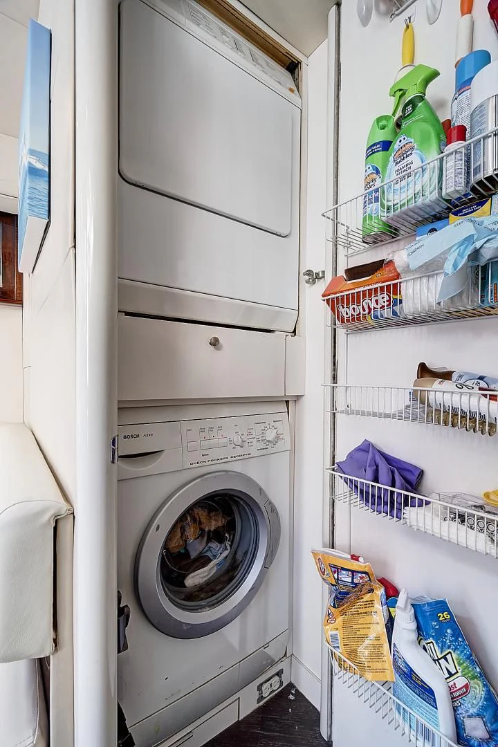 a white laundry machine aboard LADY H Yacht for Sale