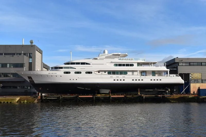 a large white boat docked aboard DANCING HARE Yacht for Sale