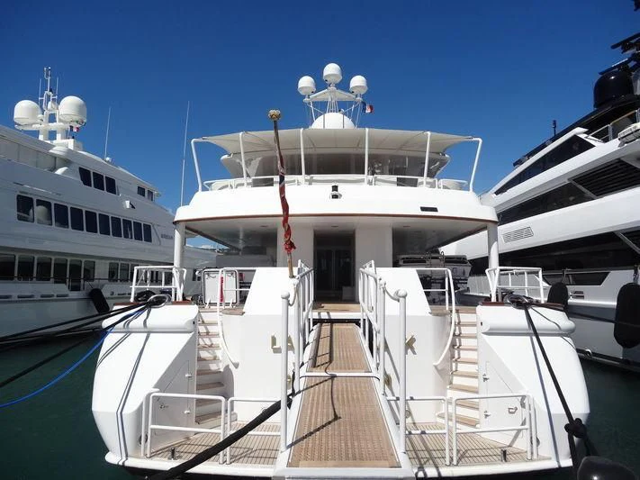 a boat docked at a pier aboard DANCING HARE Yacht for Sale