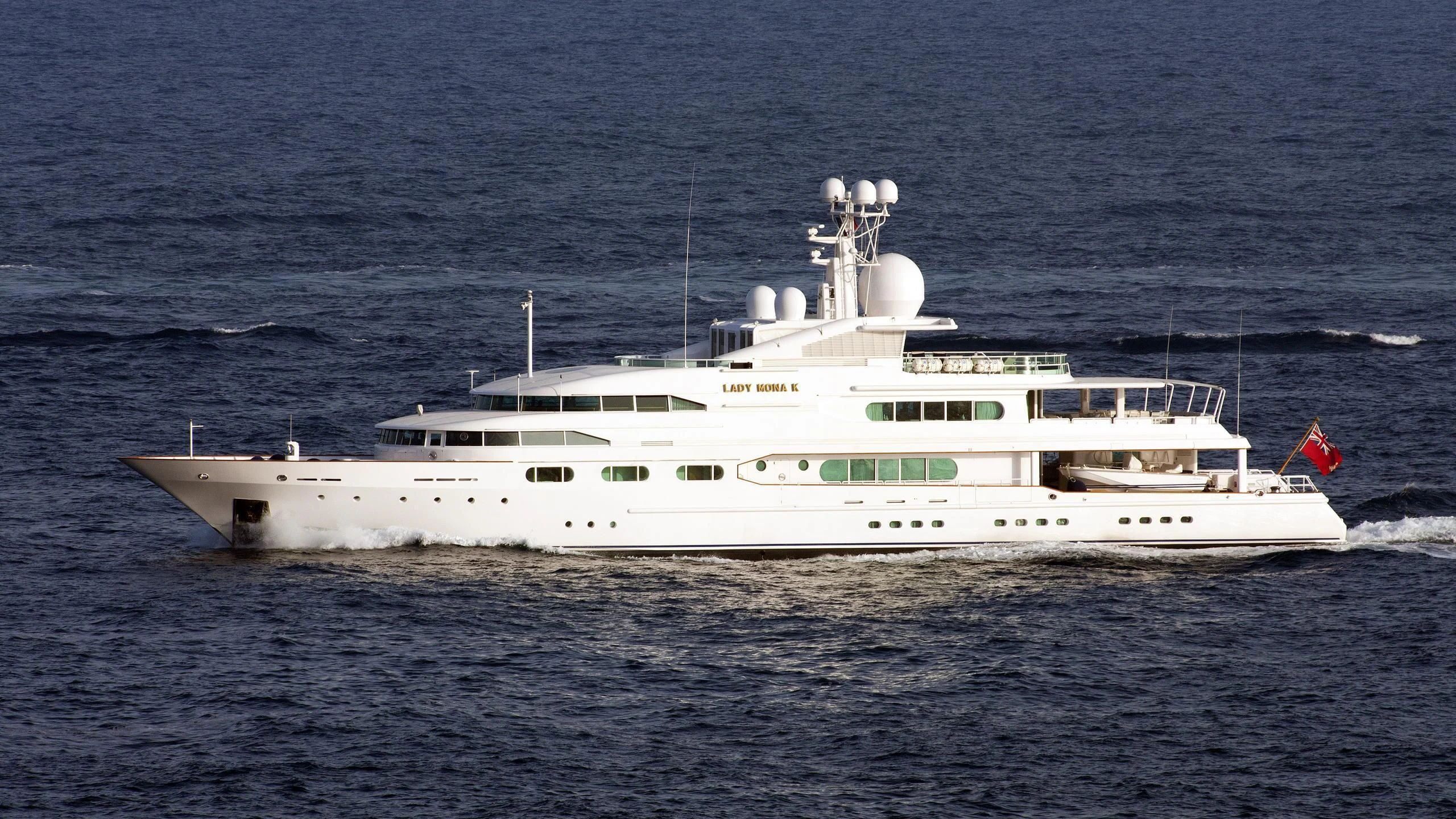 a large white ship in the water aboard DANCING HARE Yacht for Sale