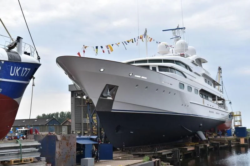 a large white boat docked aboard DANCING HARE Yacht for Sale