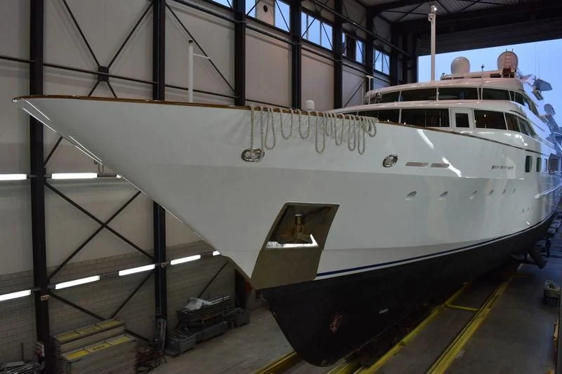 a large white airplane in a hangar aboard DANCING HARE Yacht for Sale