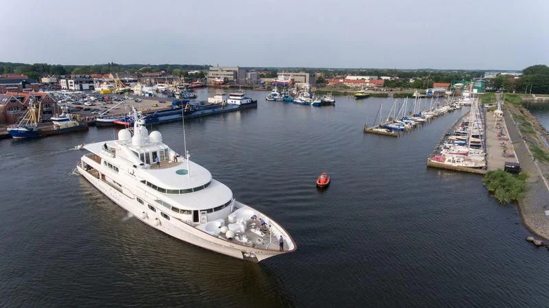 a large ship in the water aboard DANCING HARE Yacht for Sale