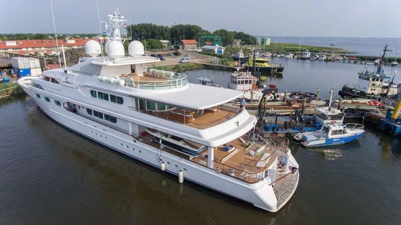 a large ship in the water aboard DANCING HARE Yacht for Sale