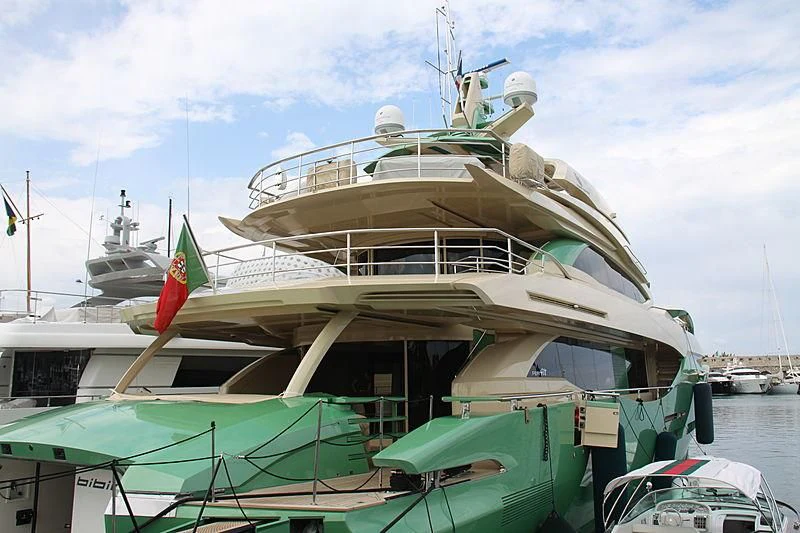 a large boat docked at a pier aboard ALMAHA Yacht for Sale