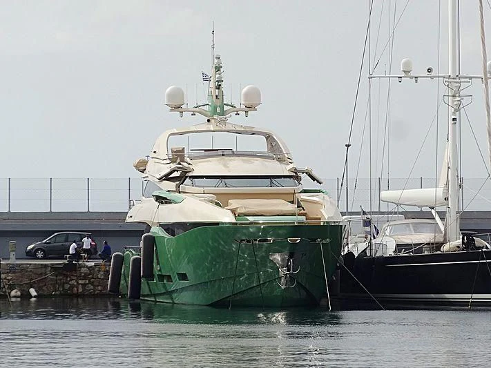 a large boat docked at a dock aboard ALMAHA Yacht for Sale