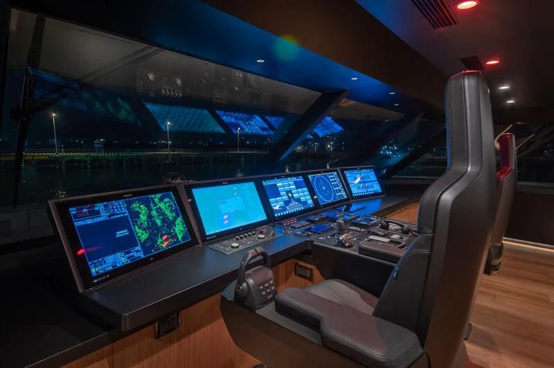 inside of a car with monitors and screens aboard SPACECAT Yacht for Sale