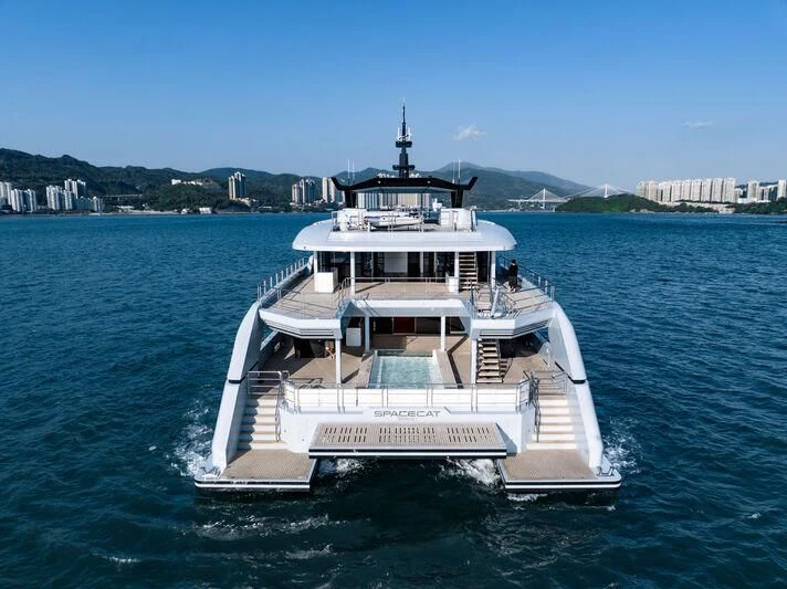 a large boat in the water aboard SPACECAT Yacht for Sale