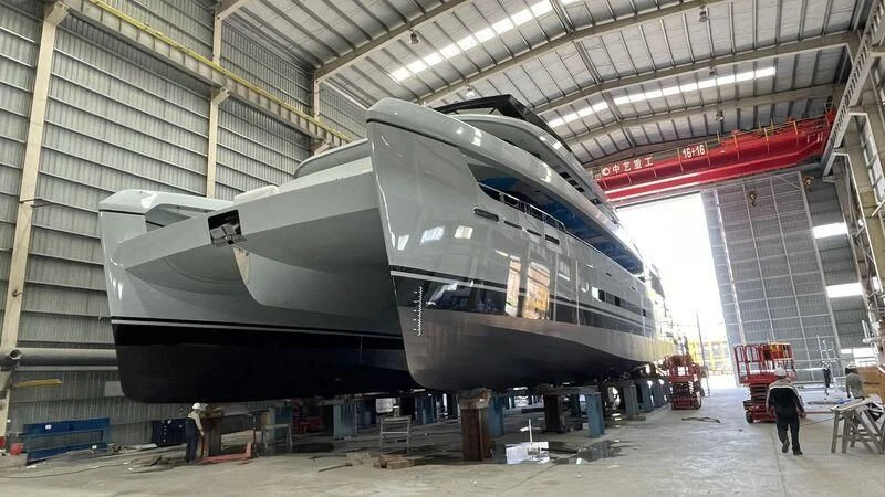 a large space shuttle in a building aboard SPACECAT Yacht for Sale