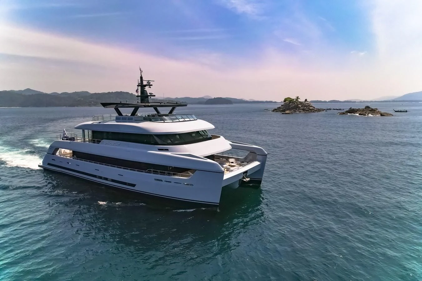 a boat on the water aboard SPACECAT Yacht for Sale