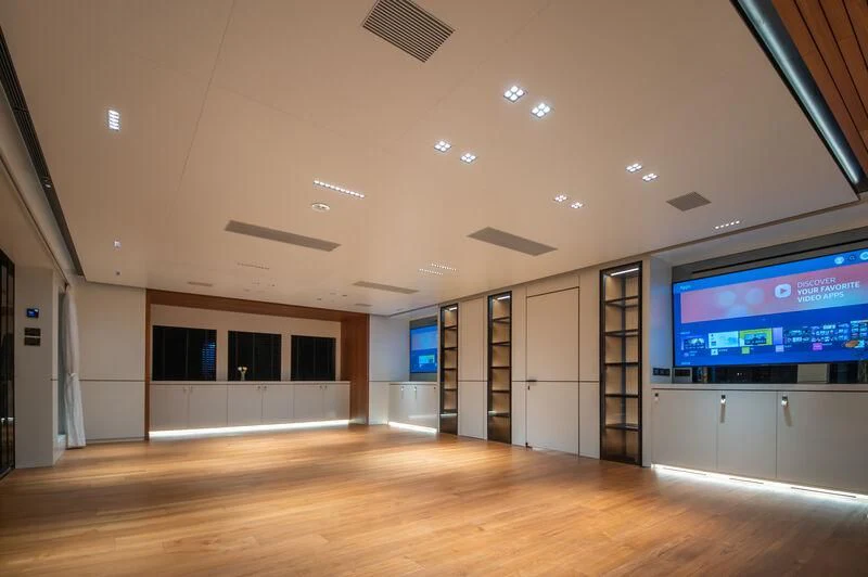 a room with a large tv aboard SPACECAT Yacht for Sale