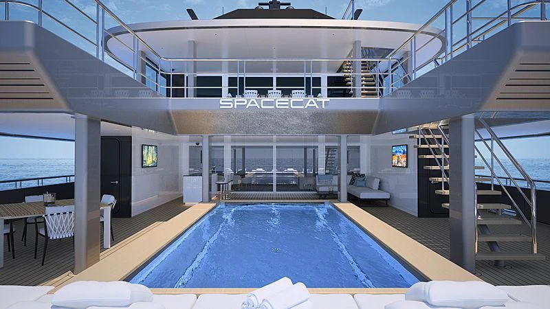 a swimming pool in a building aboard SPACECAT Yacht for Sale